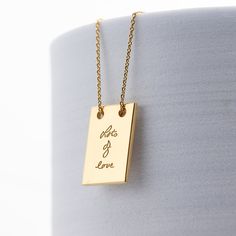 RECTANGLE FINGERPRINT NECKLACE- LOVED ONE'S FINGERPRINT NECKLACE- HANDWRITING NECKLACE DETAILS: Material: .925 Sterling Silver - Color: Silver, Gold Filled, Rose Gold Filled *Gold Filled is made of thick 14k gold or rose gold layered on .925 sterling silver. - Pendant side: 14X20mm - Chain type: there are 2 kind of chain ( cable chain- figaro chain) - Chain Length: Select the length you want from the Length drop down menu. PERSONALIZATION You can choose the chain style and engraving style from d Meaningful Gift Necklace, Meaningful Rectangular Necklaces For Gifts, Meaningful Rectangular Necklace For Gift, Inspirational Rectangular Jewelry For Gifts, Artistic Rectangular Necklace For Gifts, Artistic Rectangular Necklace For Gift, Minimalist Rectangular Valentine's Day Jewelry, Minimalist Rectangular Jewelry For Valentine's Day, Fingerprint Necklace