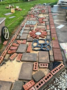 bricks are laid out on the ground to be used as walkways