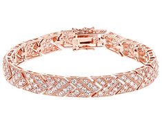 Bella Luce ® white diamond simulant 8.85ctw round, Eterno™ 18k rose gold over sterling silver tennis bracelet. Measures approximately 7.25" or 8"L x 0.31"W and has a hidden box closure. The diamond equivalent weight is 4.56ctw. Dazzling Rose Gold Tennis Bracelet With Diamond Accents, Dazzling Rose Gold Tennis Bracelet With Cubic Zirconia, Dazzling Rose Gold Cubic Zirconia Tennis Bracelet, Rose Gold Tennis Bracelet With Pave Setting As Gift, Fine Jewelry Rose Gold Tennis Bracelet, Formal Rose Gold Cubic Zirconia Tennis Bracelet, Silver Tennis Bracelet, Man Made Diamonds, Diamond Simulant