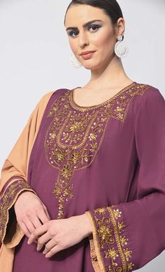 Indulge in the epitome of ethnic elegance with our exquisite 3-piece Salwar Kameez set. Intricately crafted, the Kameez boasts machine embroidery, handwork motifs, and delicate moti and CD embellishments adorning the front placket, exuding opulence and sophistication. Enhancing its allure, the Kurta features side pockets for modern convenience and intricate handwork detailing on the hem for added charm. Accompanied by a Piping matching dupatta, this ensemble effortlessly blends tradition with contemporary style, making it perfect for a myriad of occasions, from festive celebrations to formal gatherings. Elevate your wardrobe with this timeless ensemble that celebrates the artistry of Indian craftsmanship. Size & FitModel height is 5’9’ and is wearing a Small sizeMaterial & CareMaterial: Ra Elegant Embroidered Salwar Kameez For Eid, Georgette Sets With Embroidered Border For Diwali, Wedding Salwar Kameez With Embroidered Border For Eid, Eid Wedding Salwar Kameez With Embroidered Border, Diwali Sets With Embroidered Border In Georgette, Unstitched Palazzo Set With Embroidered Border For Eid, Traditional Georgette Churidar For Eid, Anarkali Sets With Embroidered Border For Eid, Elegant Palazzo Set With Embroidered Border For Eid