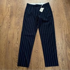 Gant Blue Pinstriped Wool Blend Pants Size 48. New With Tags Our Pinstriped Pants, In A Wool-Polyester Blend, Feature A Looser Fit, A Yarn-Dyed Pinstriped Pattern, Slanted Front Pockets, Two Buttoned Double-Welted Back Pockets And A Zip Fly With A Tab Hook Closure. Measurements Taken Flat Waist 16.5” Rise 11” Inseam 31” Blue Vertical Stripes Pants For Workwear, Blue Vertical Stripes Workwear Pants, Blue Vertical Stripes Pants For Work, Striped Ankle Pants For Business Casual, Striped Tapered Leg Dress Pants For Business Casual, Striped Tapered Leg Bottoms For Work, Mens Dress Slacks, Suspender Pants, Linen Blend Pants