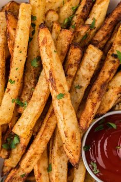 french fries with ketchup and parsley on the side