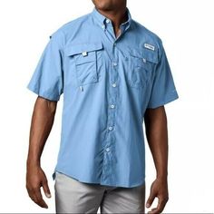 Men’s PFG Bahama™ II Short Sleeve Shirt Men’s PFG Bahama Runs Large, Consider sizing down Measurements: 26.5" across chest 23" across shoulders 30" Shirt length 9.5" sleeve length Details Style # FM7047 FISH EASY Designed specifically for anglers, this lightweight, Relaxed Fit, nylon shirt dries fast, keeps you cool, and protects against UV rays. COOLING Mesh-lined back vents let in and out a cooling breeze—perfect in hot, humid weather. PERFORMANCE DETAILS A rod holder provides hands-free conve Mens Fishing Shirts, Grey Goose, Columbia Shirt, Instagram Wedding, Jewelry Women, Boys Baby, Country Outfits, Wedding Pics, Columbia Sportswear