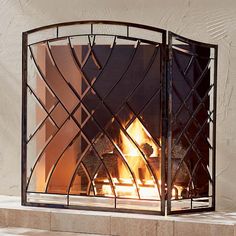 a fireplace with a fire inside of it