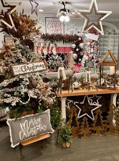 a christmas display in a store filled with lots of holiday decorations