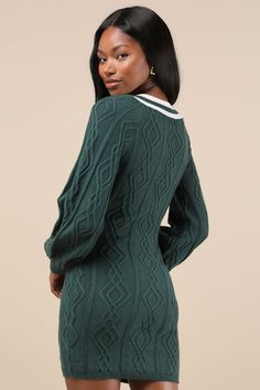 The delightful vibes of the Lulus Inviting Poise Green and White Cable Knit Sweater Mini Dress will have feeling absolutely darling all season long! This cozy sweater dress boasts a classic cable knit design throughout the flirty bodycon silhouette that features a V-neckline, long balloon sleeves with fitted cuffs, and a cute mini hem. Varsity-inspired white stripes accent the neckline to add a sense of collegiate charm, while contrasting ribbed knit at the cuffs and hems complete the look! Fit: Cable Knit Long Sleeve Dress, Cozy Cable Knit Long Sleeve Dresses, Cozy Long Sleeve Cable Knit Dress, Knee-length Cable Knit Sweater, Cozy Cable Knit Sweater Dress For Spring, Long Sleeve Pointelle Knit Sweater Dress, Fall Pointelle Knit Sweater Dress, Elegant Pointelle Knit Sweater Dress For Winter, Chic Green Knit Sweater Dress