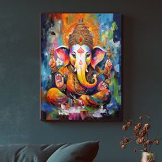 an elephant painting is hanging on the wall above a couch with a vase and plant