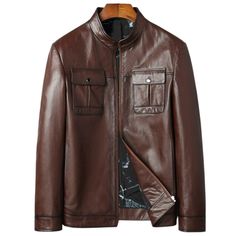 For A Refined, Sleek Look, Add This Cool Jacket To Your Wardrobe Staples. Featuring Two Front Flap Pockets And Ultra Lightweight Constructed From Lambskin Leather. Great For Outdoors And Party Wear! Features Outer Shell: Real Lambskin Leather Finish: Nappa Lining: Fully Lined With Polyester Taffeta Closure Style: Front Metal Button Closure Collar Style: Mandarin Cuffs Style: Button Snap Outside Pockets: 2 Front Flap Patch Pockets Inside Pocket: One Zippered Pocket Luxury Brown Business Outerwear, Luxury Brown Outerwear For Business, Luxury Brown Outerwear With Pockets, Classic Brown Leather Jacket For Winter, Masculine Leather Outerwear With Pockets, Brown Business Outerwear With Pockets, Luxury Brown Leather Jacket For Work, Luxury Brown Leather Jacket With Pockets, Brown Leather Outerwear With Zipper Closure