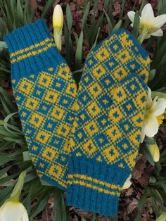 Knitted with two colored yarn (bright yellow and sky blue) in traditional Estonian fair-isle style.  Tightly knitted using 0-size needles and worsted weight yarn, they are perfect to block wind and wear in winter. This pattern comes from Vaivara area in Ida-Viru County, Estonia and is well used throughout the country due to simple beauty. The tight 2x2 ribbing keeps your wrists warm during the coldest winter days.Women's size, also available for custom order in any sizes. Multicolor Nordic Fair Isle Pattern, Nordic Fair Isle Multicolor Pattern, Multicolor Hand Knitted Nordic Pattern, Nordic Multicolor Hand Knitted Patterns, Nordic Multicolor Winter Patterns, Nordic Winter Multicolor Patterns, Multicolor Nordic Winter Patterns, Fitted Winter Crochet Patterns, Fitted Crochet Patterns For Winter