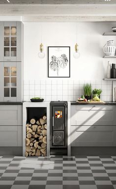 a stove top oven sitting inside of a kitchen next to a pile of firewood