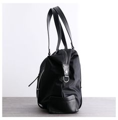 Overview： Design: Womens Nylon Leather Gym Handbags Womens Black Nylon Gym Purse Nylon Work Shoulder Purse for LadiesIn Stock: Ready to Ship (2-4 days)Include: Only BagCustom: NoColor: BlackLeather: Nylon, LeatherMeasures: 39 cm x 35cm x 14cm Weight: 0.65kgSlots: 2 main slots, 2 zipper slot, 1 phone pocket, 1 wallet pocket, 2 side slotsAccessories(option): NoneStyle: Womens Nylon Leather Gym Handbags Womens Black Nylon Gym Purse Nylon Work Shoulder Purse for LadiesVery durable (At least 5 Years) Nylon Bags With Leather Trim For Commuting, Commuting Nylon Bags With Leather Trim, Black Nylon Shoulder Bag With Leather Trim, Nylon Bags With Zipper Pocket For Work, Nylon Work Bags With Zipper Pocket, Everyday Nylon Shoulder Bag With Leather Trim, Black Nylon Shoulder Bag For Business, Functional Nylon Shoulder Bag For Work, Nylon Shoulder Bag With Zipper For Work