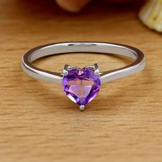 Genuine Heart Shape Amethyst Solitaire February Birthstone Ring ~ Dainty Engagement / Minimalist Fashion New! Retail Price: $99 Metal: Solid 925 Sterling Silver Finish: High Polish Hallmark: Stamped 925 Stone: Amethyst Stone Weight: 0.50 Carats Stone Shape: Heart Shape Sizes Available: 7, 8, 9 February Birthstone Gift Box & Jewelry Cleaning Cloth Included! #080112 Available In Ruby, Emerald, Citrine, Sapphire & Aquamarine Perfect Genuine Gemstone Solitaire Ring! Dainty Ring Is A Perfect Everyday Amethyst Heart Ring, Sterling Silver Amethyst Promise Ring For Valentine's Day, Silver Amethyst Heart Ring For Anniversary, Silver Heart Cut Amethyst Ring For Wedding, Silver Amethyst Heart Cut Ring Gift, Heart Cut Amethyst Ring For Anniversary, Sterling Silver Amethyst Ring For Valentine's Day Promise, Silver Amethyst Ring For Valentine's Day Gift, Elegant Silver Amethyst Ring For Valentine's Day