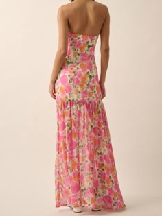 Details: PRE ORDER 5/28 Strapless asymmetrical dress Floral Straight neckline Side slit Size + Fit: Model is 5'4 Wearing size small Fabric + Care: 100% polyester Shipping + Return: Free US ground shipping on orders $100+ We offer free returns and a refund in the form of store credit with items not worn within 10 days of delivery For more info on returns visit our returns page Mini Graduation Dress, Summer Dresses Long, Maxi Summer Dress, Asymmetrical Maxi Dress, Strapless Summer Dress, Colorful Dress, Maxi Dress Pattern, Straight Neckline, Strapless Maxi Dress