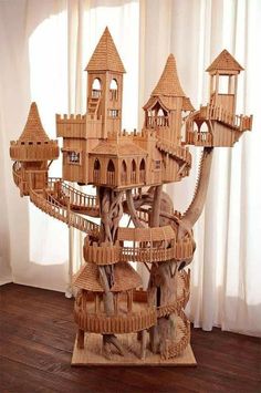 a wooden model of a castle made out of wood