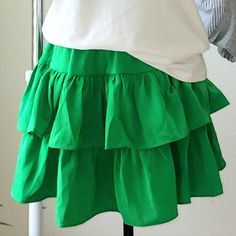 Nwot Made In Korea With Inner Short Free Sz: Fits: S-M Waistline: 26-36" Green Ruffled Skirted Skort, Green Ruffled Skort, Green Ruffled Mini Skort, Green Tiered Skirt Skort With Ruffles, Green Tiered Ruffle Skort, Green Ruffled Bottoms For Day Out, Trendy Green Tiered Skirt, Spring Ruffled Skort In Solid Color, Green Tiered Ruffles Mini Skirt