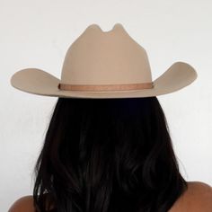 The Upland Western Cowboy Hat seamlessly blends the rustic charm of the Wild West with a dash of futuristic boho flair. With its distinctive cowboy silhouette, complete with a cattleman creased crown and a stylish upturned brim, this hat exudes classic Texan allure. The leather band is adorned with gleaming silver jewels, adding a contemporary twist to this timeless fashion statement. Handcrafted and meticulously embroidered with the initials "BTR," this hat exemplifies the perfect fusion of tra Cowboy Silhouette, Western Cowboy Hats, The Wild West, Silver Jewels, Cowboy Hat, Waxed Cotton, Western Cowboy, Wild West, Leather Band