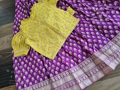 This Lehenga suits 7 yr - 8 yr. Kindly please contact us if needed measurements before purchase. Fitted Purple Sets With Motifs, Purple Fitted Sets With Motifs, Purple Brocade Bollywood Sets, Purple Bollywood Brocade Sets, Fitted Silk Lehenga With Motifs, Yellow Sets With Unstitched Blouse For Traditional Ceremonies, Fitted Lehenga For Traditional Ceremonies, Fitted Long Sleeve Lehenga For Traditional Ceremonies, Fitted Long Sleeve Choli For Traditional Ceremonies