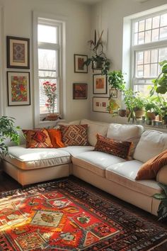 a living room filled with lots of furniture and plants on top of windowsills