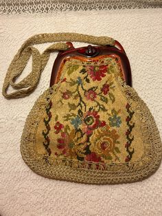 Vintage Tapestry Miriam LefCourt Elgantly Yours, Handbag, Hand Crafted in Italy Tapestry in beautiful condition, inside lining needs stitching on both sides, overall lining in good vintage condition for its age. Some light stains. Some minor scuffs on brown frame, otherwise also in beautiful vintage condition. Handbag could use a good gentle cleaning. Vintage Tapestry Pouch Bag, Vintage Tapestry Handmade Bags, Vintage Handmade Tapestry Bag, Antique Tapestry Bags For Everyday, Vintage Beige Tapestry Bag, Vintage Handwoven Satchel Bag, Vintage Handwoven Satchel Shoulder Bag, Vintage Crochet Shoulder Bag For Daily Use, Vintage Tapestry Travel Bag