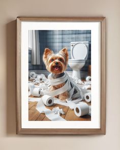 a small dog is sitting on the floor surrounded by toilet paper