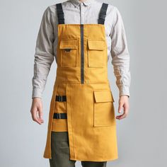 This item is for one apron only, all the other accessories are not included. Unisex Cooking Denim Apron with Pockets Buckle Strap Baking Barber Chef Work Size (as shown in the picture): hem width 60cm (23.62 inches), length 75cm (29.52 inches). Material: denim Color: as shown in the photos, please allow slight color difference. SKU: BAY-B992/JYY Work Clothes For Men, Art Aprons, Cafe Uniform, Jean Apron, Fashion Apron, Work Apron, Chef Clothes, Denim Apron, Work Aprons