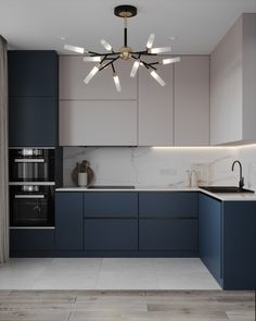 a kitchen with blue cabinets and white counter tops