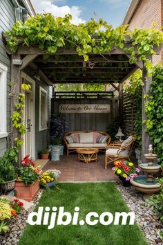 an outdoor covered patio with lots of greenery