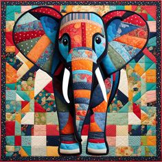 an elephant is standing in front of a colorful quilt