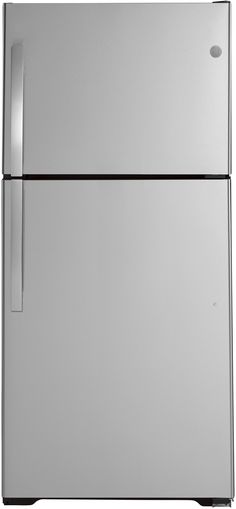 a silver refrigerator freezer sitting on top of a white counter