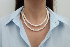 This is a gorgeous vintage handmade necklace made with freshwater pearls. It is a unique piece due to the round-shaped freshwater pearls. The necklace is a beautiful gift to yourself or others! These pearls can fit with any outfit, ranging from casual to formal. Pearls should be a part of everybody's collection. The necklace's clasp is a 18k gold filled filigree clasp. The pearls are 8mm.  ~Measurement Details~ 15" choice: inner strand is 15" and the outer strand is 16" 16" choice: inner strand is 16" and the outer strand is 17" 18" choice: inner strand is 18" and the outer strand is 19" 20" choice: inner strand is 20" and the outer strand is 21" 22" choice: inner strand is 22" and the outer strand is 23" 24" choice: inner strand is 24" and the outer strand is 25" **Do not use liquid chemi Handmade Classic Pearl Necklace As Gift, Classic Handmade Pearl Necklace Gift, Handmade Classic Pearl Necklace Gift, Classic Handmade Pearl Necklace With Round Beads, Handmade Classic Pearl Necklace For Formal Occasions, Necklace Clasps, Looking Forward To Seeing You, Cute Nike Shoes, Cute Nikes