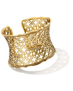 Our classic filigree is reimagined with vintage-style metal finishes to create the Candice Statement Cuff Bracelet in Vintage Gold. This show-stopping metallic cuff bracelet will take you from day to night (and everywhere in between) with ease.r r This bracelet is a part of Yellow Rose by Kendra Scott—a brand that celebrates the American Southwest with Kendra Scott staples alongside select curated jewelry pieces and accessories.,MetalVintage 23k Yellow Gold Over BrassDue to the one-of-a-kind nat Elegant Cuff Bracelet With Intricate Design, Gold Cuff Bracelet With Intricate Design, Elegant Metal Cuff Bracelet With Intricate Design, Short Pendant Necklace, Statement Cuff Bracelet, Gold Cuff Bracelet, Metal Cuff Bracelet, Gold Bracelet Cuff, American Southwest