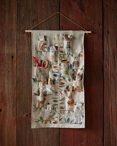 a tea towel hanging on a wooden wall