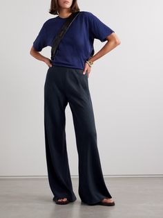 La Ligne's 'Colby' pants are the ideal combination of elevated and comfortable. Made from woven fabric with slubbed details, they have an elasticated, high waistband and soft folds along the wide legs. Wear yours with a crisp collared shirt or one of the label's striped sweaters. Wide Leg Navy Pants, Striped Sweaters, Winter Work Wear, Denim Flats, Flat Dress Shoes, Online Closet, Dress Flats, Sport Swimwear, Sports Skirts