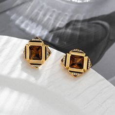 Square Glass Vintage Earrings Step back in time with our Square Glass Vintage Earrings, a stunning blend of classic design and modern elegance. These earrings are the perfect accessory for anyone looking to add a touch of sophistication to their wardrobe. Key Features: Unique Design: The square shape offers a contemporary twist on traditional vintage styles, making them a must-have for fashion-forward individuals. High-Quality Glass: Crafted from premium glass, each earring is designed for durab Classic Brown Jewelry With Matching Earrings, Modern Brown Earrings For Formal Occasions, Elegant Brown Earrings For Anniversary, Elegant Brown Jewelry, Elegant Brown Jewelry For Formal Occasions, Elegant Brown Evening Jewelry, Elegant Brown Crystal Earrings Gift, Vintage Jewelry Necklace, Amber Earrings