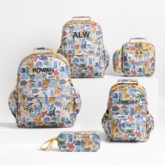 four backpacks with different animal designs and name written on the front, back, and side