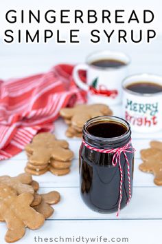 gingerbread simple syrup recipe in a jar with cookies and mugs on the side