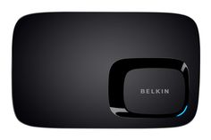 the belkin tv box is black and has a blue light on it's side