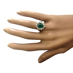 Stamped: 14K Yellow Gold Total Ring Weight: 5.2 Grams Ring Length: N/ARing Width: N/A Gemstone Weight: Total Natural Emerald Weight is 3.33 Carat (Measures: 10.55x8.50 mm) Color: GreenDiamond Weight: Total Natural Diamond Weight is 1.00 Carat Quantity:12 Color: F-G, Clarity: VS2-SI1 Face Measures: 16.65x14.50 mm Sku: [703872W] Luxury Formal Rings For May Birthstone, Formal Diamond Ring With Prong Setting For May Birthstone, Formal Emerald Cluster Ring With Accent Stones, Elegant Emerald Ring With Prong Setting, Formal Emerald Birthstone Ring With Center Stone, Formal May Birthstone Diamond Ring With Prong Setting, Formal May Birthstone Diamond Ring With Center Stone, Dazzling Green Rings For Formal Occasions, Green Dazzling Rings For Formal Occasions