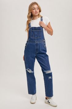 Model is 5'1", 34D, 6/28 and is wearing a size small. Item runs true to size with a relaxed denim fit. Our Macintosh Overalls features a medium wash true denim material with distressing in knees, adjustable straps, functional buttons on side of waistline, straight leg fit. Inseam approx. 28" (see last picture for 5' 8" model unrolled) More details: 43% cotton 29% viscose 28% polyester. hand wash or wash on cold and hang to dry. Denim Material, Short Leggings, Denim Overalls, Tops Fall, Skirt Pants, Denim Pants, Set Dress, Sweater Top, Sweaters & Cardigans