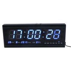 an alarm clock with blue numbers on the front and back sides is shown in black