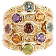 Fashionable ring by Sonia B with five bands that merge as one on the shank. The ring has nine stones that include: amethyst; citrine; peridot; blue topaz and tourmaline. Between the stones are diamonds for some added sparkle. The ring is size 6 3/4 and can easily be sized up or down. It measures 7/8" in the center from front to back. Nine Stones, Ladies Gold Rings, Antique Cocktail Ring, Rose Gold Oval Engagement Ring, Multi Band Ring, Pink Gold Rings, Gemstone Diamond Ring, Gold Gemstone Ring, Bridal Gold Jewellery Designs