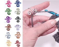 a hand holding a crochet hook with several colors of yarn