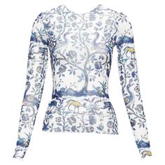 MARQUES ALMEIDA blue white animal floral print mesh long sleeve top XS Reference: AAWC/A01124 Brand: Marques Almeida Material: Polyester, Blend Color: White, Blue Pattern: Floral Closure: Pullover Extra Details: Semi sheer Made in: Portugal CONDITION: Condition: Excellent, this item was pre-owned and is in excellent condition. This piece appears to be unworn and is in great condition. Comes with: Style code present (Generic) SIZING Designer size: XS Size reference: US0 / UK6 / IT38 / FR34 / XXS- Blue Long Sleeve Sheer Blouse, Blue Sheer Long Sleeve Blouse, White Sheer Long Sleeve Mesh Top, White Long Sleeve Mesh Top For Spring, Blue Stretch Tops With Sheer Sleeves, Blue Long Sleeve Tops With Mesh Sleeves, Blue Tops With Mesh Sleeves For Summer, White Long Sleeve Top With Sheer Sleeves, White Long Sleeve Tops With Sheer Sleeves