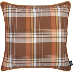 a brown plaid pillow on a white background