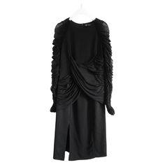 Super sexy and dramatic Versace tulle sleeve dress – from the Resort 2017 collection. Bought for over £1500 and worn twice - has been dry cleaned. Made from thick, stretchy black viscose and elastane crepe with ribbed contrast panelling, it has gorgeous ruched tulle sleeves with zip cuffs and draped silk chiffon detailing. Has a body fitting cut with that perfect just below the knee La Dolce Vita length that the Italians do so well. has concealed zip to back. Size IT40/UK8.Measures approx – bust Chic Gala Dress With Mesh Sleeves, Chic Dresses With Mesh Sleeves For Gala, Formal Midi Dress With Long Mesh Sleeves, Luxury Party Dress With Gathered Sleeves, Luxury Long Sleeve Dress With Sheer Sleeves, Stretch Midi Dress With Sheer Sleeves For Evening, Luxury Dress With Sheer Sleeves For Night Out, Luxury Night Out Dress With Sheer Sleeves, Evening Dress With Mesh Sleeves