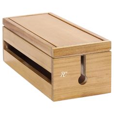 a wooden box with a drawer on it