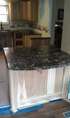 the kitchen counter is being installed and ready to be painted