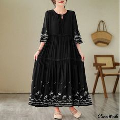 Olivia Mark - Embroidered Bohemian Style Loose Fit Maxi Dress Black Embroidered Maxi Dress For Spring, Bohemian Black Embroidered Dress For Spring, Black Cotton Dress With Floral Embroidery, Black Cotton Embroidered Dress With Floral Embroidery, Spring Black Embroidered Dress With Embroidered Hem, Black Embroidered Dress With Embroidered Hem For Spring, Black Embroidered Dress With Hem Detail For Spring, Black Cotton Embroidered Dress, Black Cotton Embroidered Short Sleeve Dress