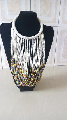 ON SALE Multistrand Beaded Necklace, African Beaded Jewelry, White Beaded Necklace, Tribal Jewelry, White Bohemian Choker With Colorful Beads, White Beaded Chain Necklaces For Festivals, White Beaded Necklace For Festivals, White Round Beaded Necklaces For Festival, White Beaded Necklace With Round Beads, White Bohemian Choker With Beaded Chain, Bohemian White Beaded Chain Choker, White Bohemian Beaded Chain Choker, White Long Necklace For Festivals