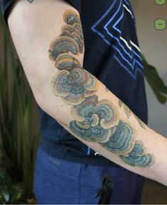 a person with a tattoo on their arm